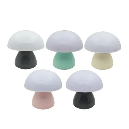 Set of five colorful mushroom-shaped lamps on a white background